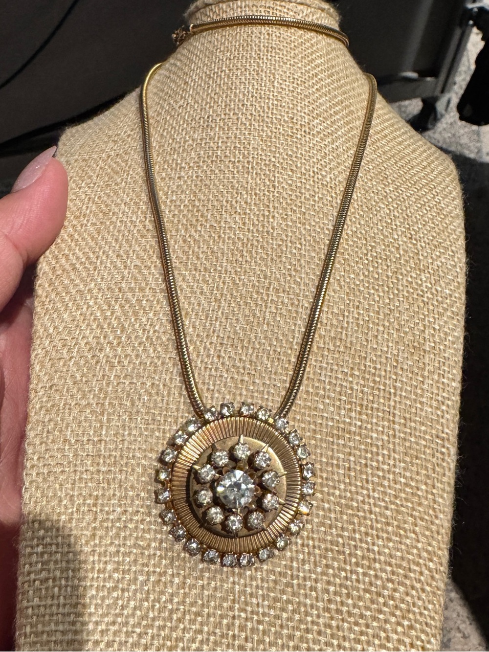Vintage starburst or sunburst medallion pendant